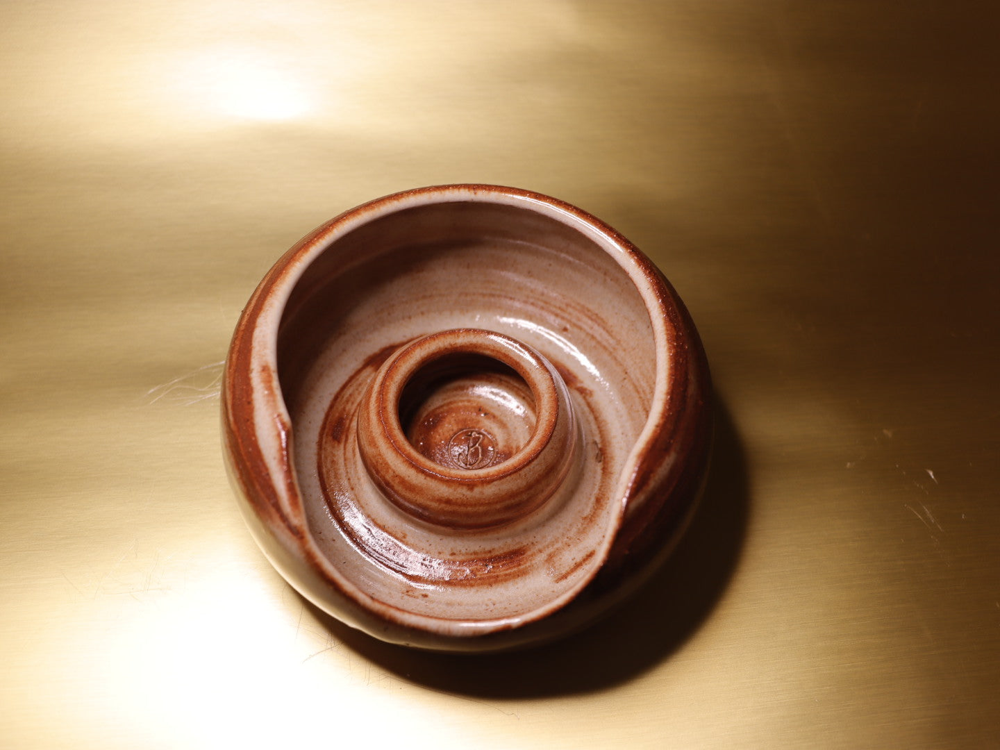 Sophisticated brown ashtray crafted for both utility and style, ideal for professional office spaces and modern homeware.